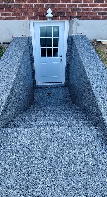 Basement walkout stairs after flake system